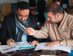 Two people attending a course in our Majnoon training centre, Iraq (photo)