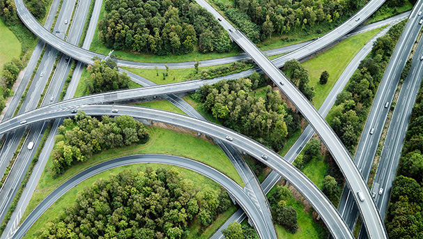 Aerial view of motorway junctions and trees (photo)