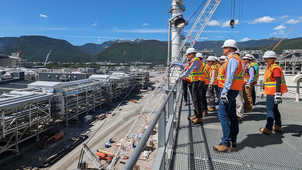 Board members viewing the LNG Canada plant construction progress (photo)