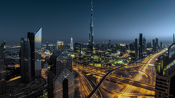 Dubai at night with a view of the Burj Khalifa