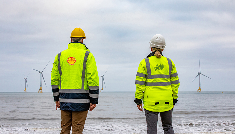 Two Shell employees at the Scotwind offshore wind park