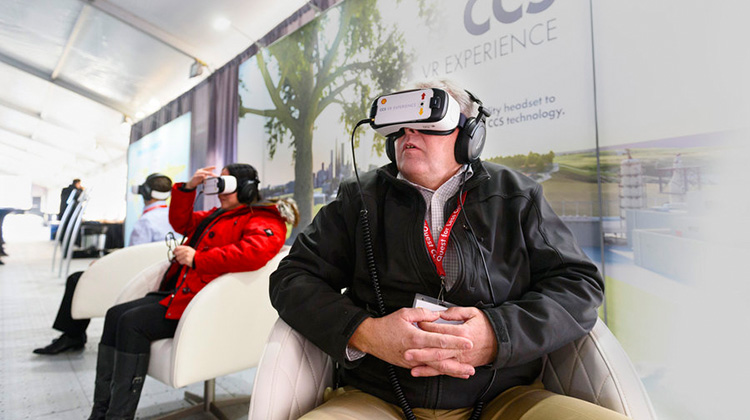 Guests at the Quest Carbon Capture and Storage (CCS) Project launch at Shell Scotford learn more about CCS through virtual reality. (photo)