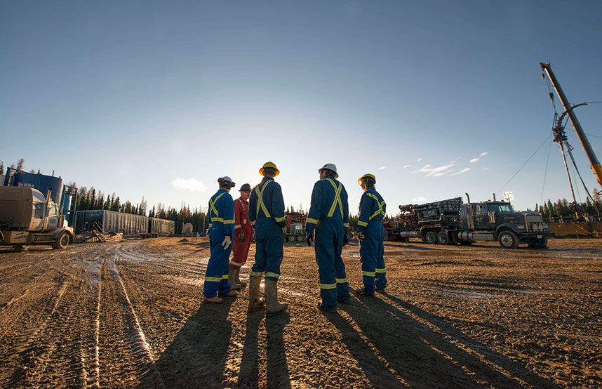 Works stop for a toolbox talk, Fox Creek, drill site in Alberta, Canada (photo)