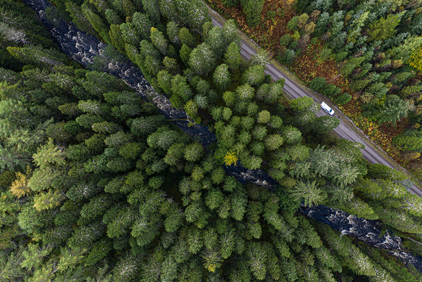 Aerial view of road and Glengarry forest, Scotland UK. Forestry and Land Scotland is working with Shell UK to preserve and extend native woodland. (photo)