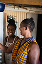 mother and daughter cooking together at home in South Africa (photo)