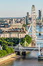 Image of London showing the river with the Shell Tower, London Eye and houses of parliament in view (photo)