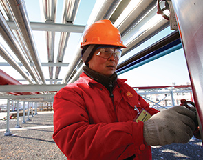 Staff working at the Changbei tight gas project, Shaanxi province, China. (photo)