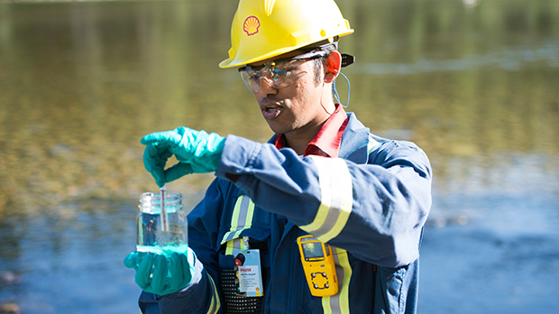 Shell environmental coordinator tests a water sample near Edson (photo)