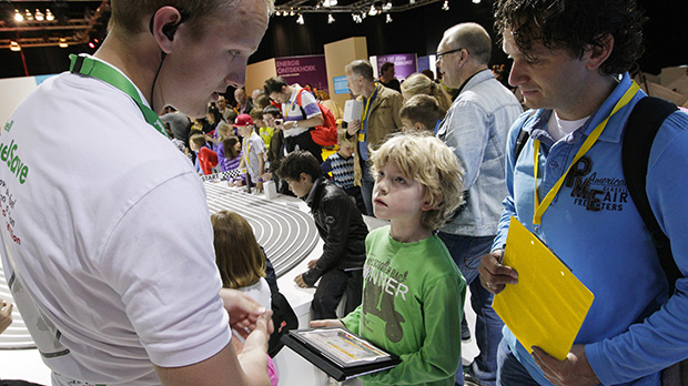 Boy with tablet at Fuel Save event (photo)