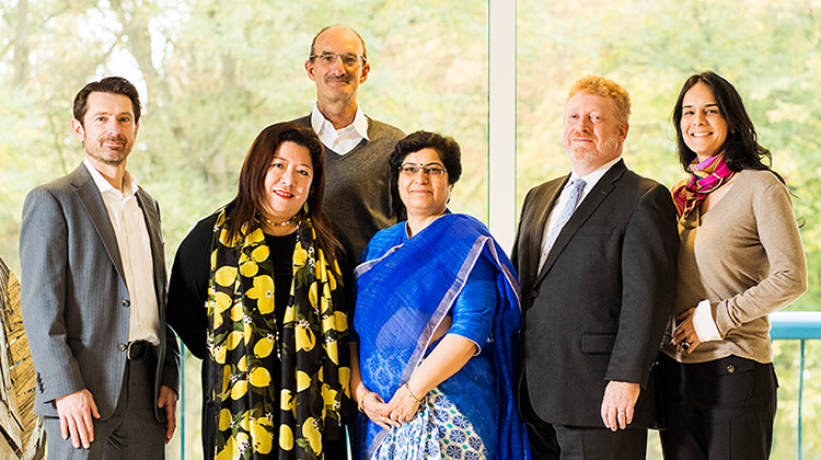 The six members of the External review committee in the Shell headquarters in The Hague (photo)
