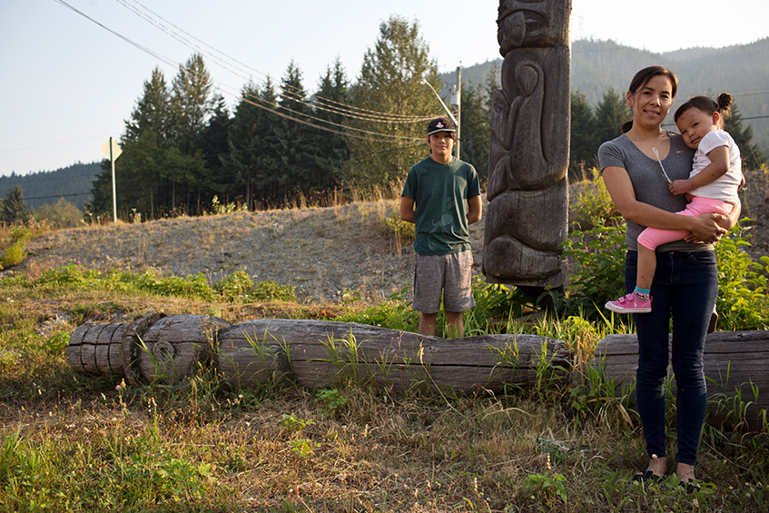 Local resident family posing at the traditional territory of the Haisla First Nation in British Columbia, Canada. (photo)
