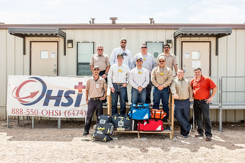 Group photo in front of a medical clinic in the Permian region. (photo)