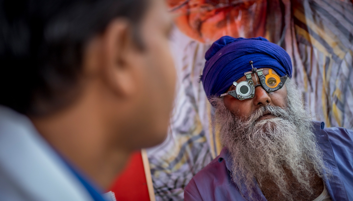 A truck driver getting his eyes checked, Eye Camps India 2019 (photo)
