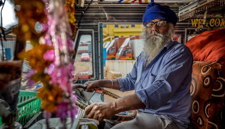 A driver at the truck stop, with his new glasses, Eye Camps India 2019 (photo)