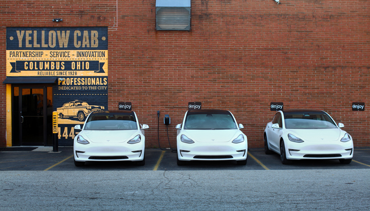 Three electric cars, Greenlots EV charging at Columbus, USA, 2019 (photo)