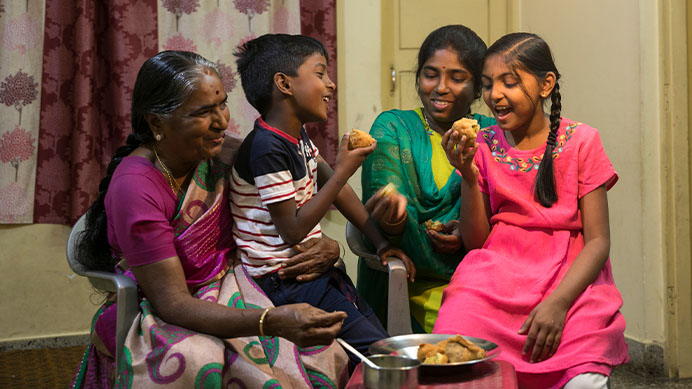 Indian familiy enjoying food together
