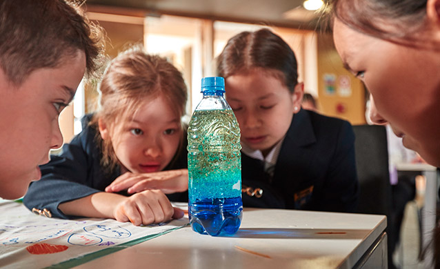 Local school children learn and get excited about Science, Technology, Engineering and Mathematics (STEM) through experiments in a “play and learn” format. Haileybury school in Astana, Kazakhstan. (photo)